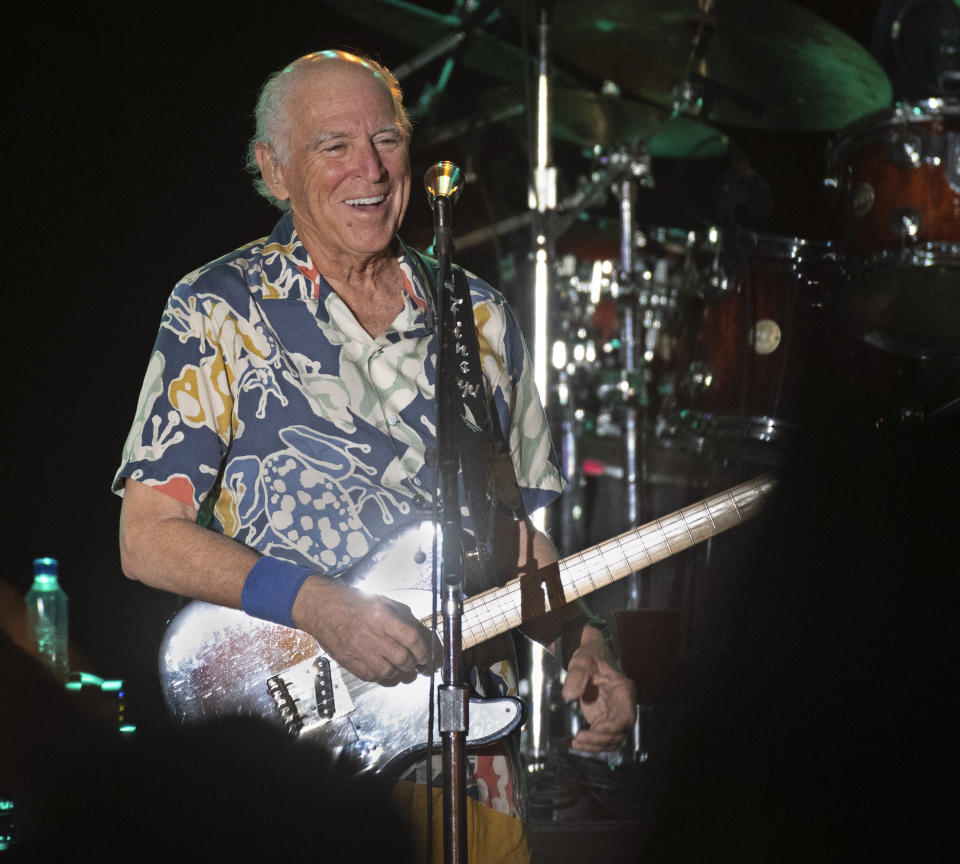 FILE - In this Thursday, Feb. 9, 2023, photo provided by the Florida Keys News Bureau, singer-songwriter Jimmy Buffett performs during a concert in Key West, Fla. Buffett, who popularized beach bum soft rock with the escapist Caribbean-flavored song “Margaritaville” and turned that celebration of loafing into an empire of restaurants, resorts and frozen concoctions, has died, Friday, Sept. 1, 2023. (Rob O'Neal/Florida Keys News Bureau via AP)