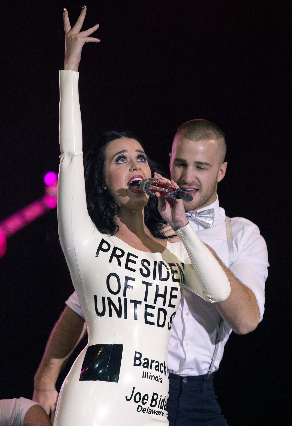 Singer Katy Perry performs before the arrival of President Barack Obama at a campaign rally, Wednesday, Oct. 24, 2012, in Las Vegas. (AP Photo/Julie Jacobson)