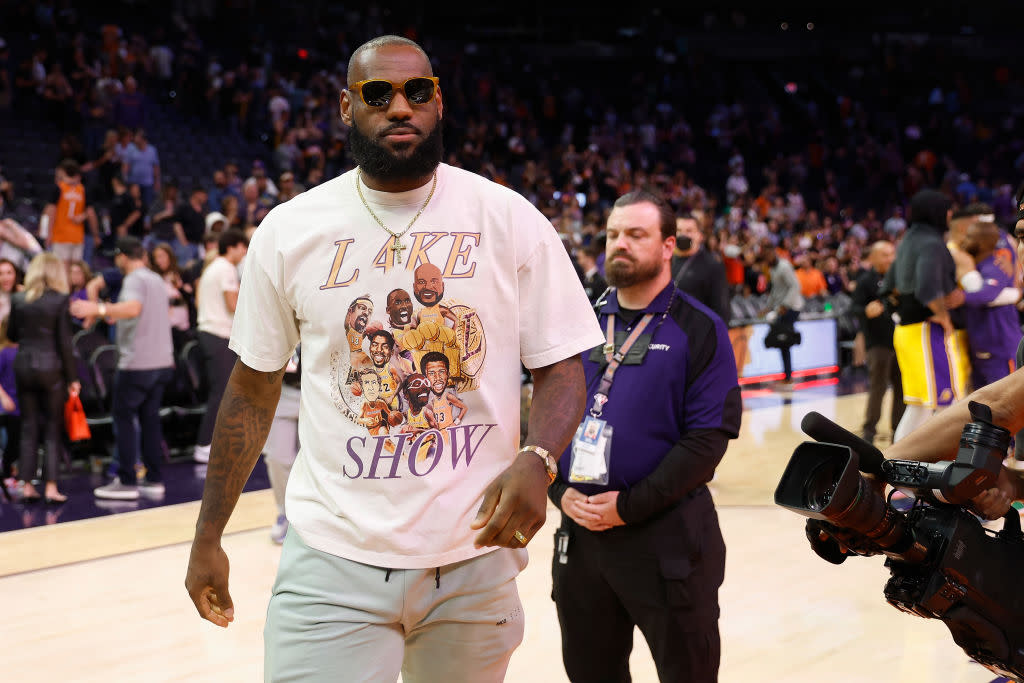 LeBron James of the Los Angeles Lakers walks off the court following the NBA game against the Phoenix Suns at Footprint Center on April 05, 2022 in Phoenix, Arizona. (Photo by Christian Petersen/Getty Images)