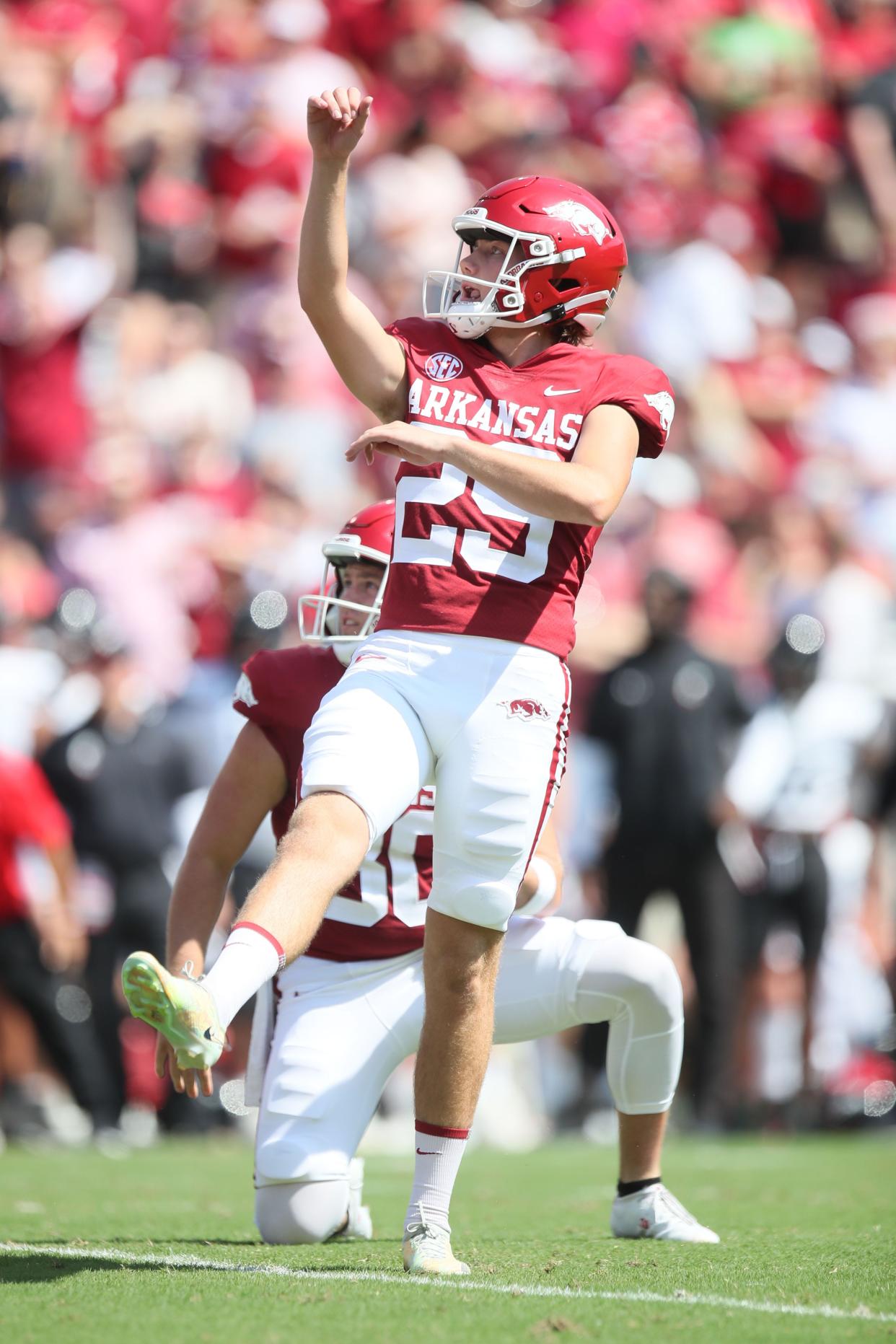 Sep 3, 2022; Fayetteville, Arkansas, USA; Arkansas Razorbacks kicker Cam Little (29) kicks an extra point in the first quarter against the Cincinnati Bearcats at Donald W. Reynolds Razorback Stadium. Mandatory Credit: Nelson Chenault-USA TODAY Sports