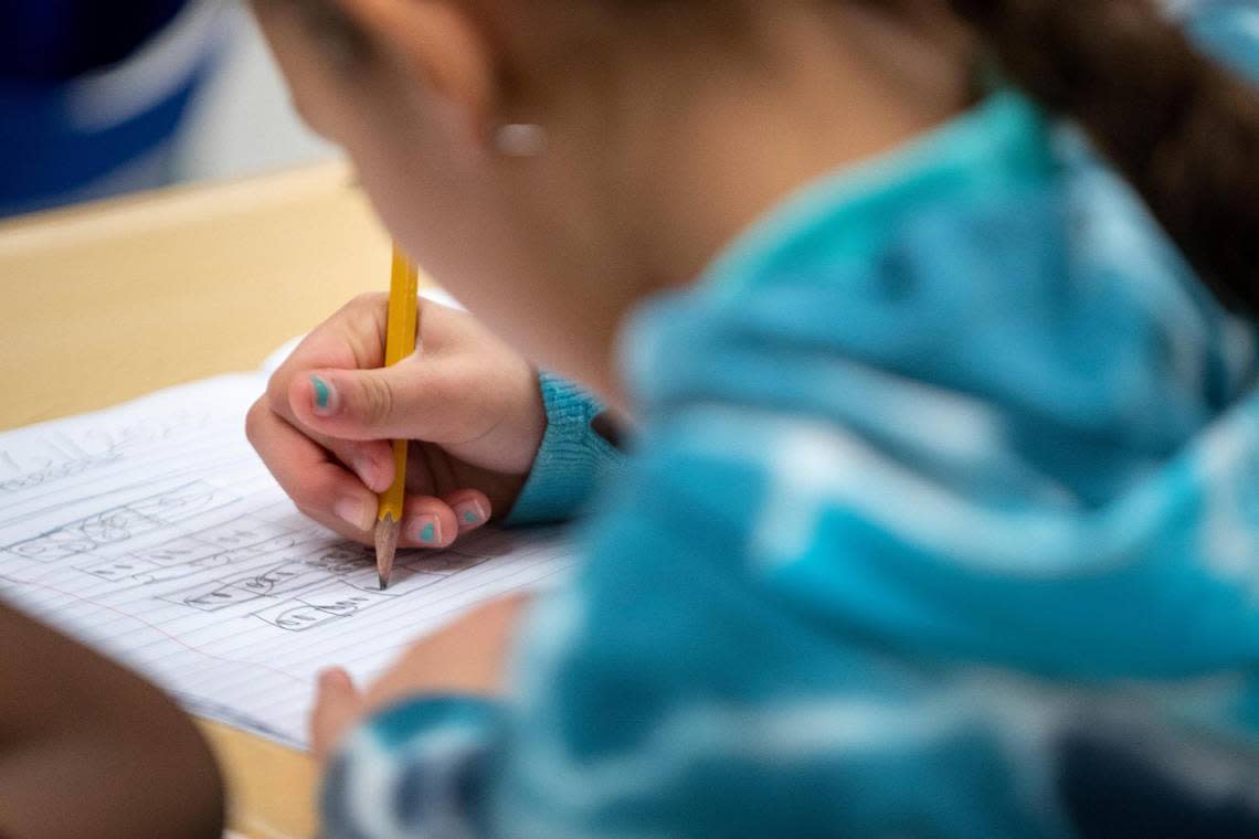 A student takes notes during a math lesson at David L. Walker Elementary in Crowley ISD on Tuesday, Feb. 7, 2023. The new Accelerated Learning Academy at Walker extends the school year to prevent learning loss.