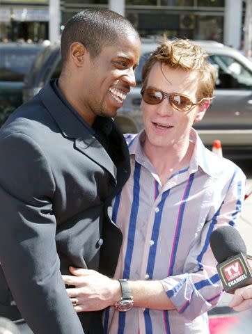<p>Kevin Winter/Getty Images</p> Ahmed Best and Ewan McGregor pose for a photo at the 2002 premiere of 'Star Wars: Episode II Attack of the Clones'