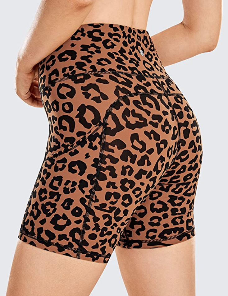 Lower torso back view of woman in leopard print CRZ YOGA Women's Sport Shorts,