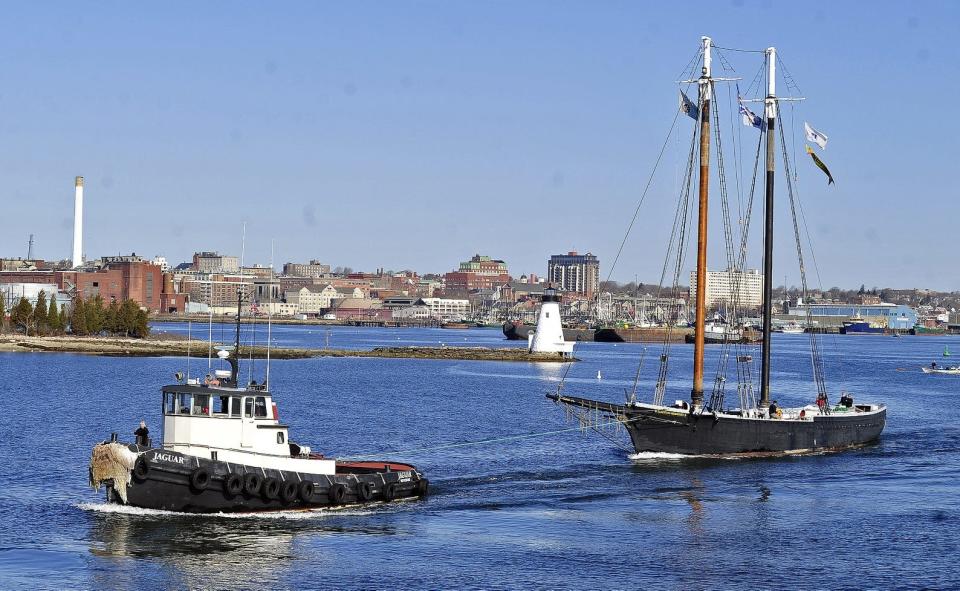 Pulled along by the tug Jaguar, the schooner Ernestina-Morrissey departs New Bedford for Boothbay Harbor restoration shipyard in Maine in 2015.  PHOTO BY DAVID W. OLIVEIRA/STANDARD-TIMES SPECIAL