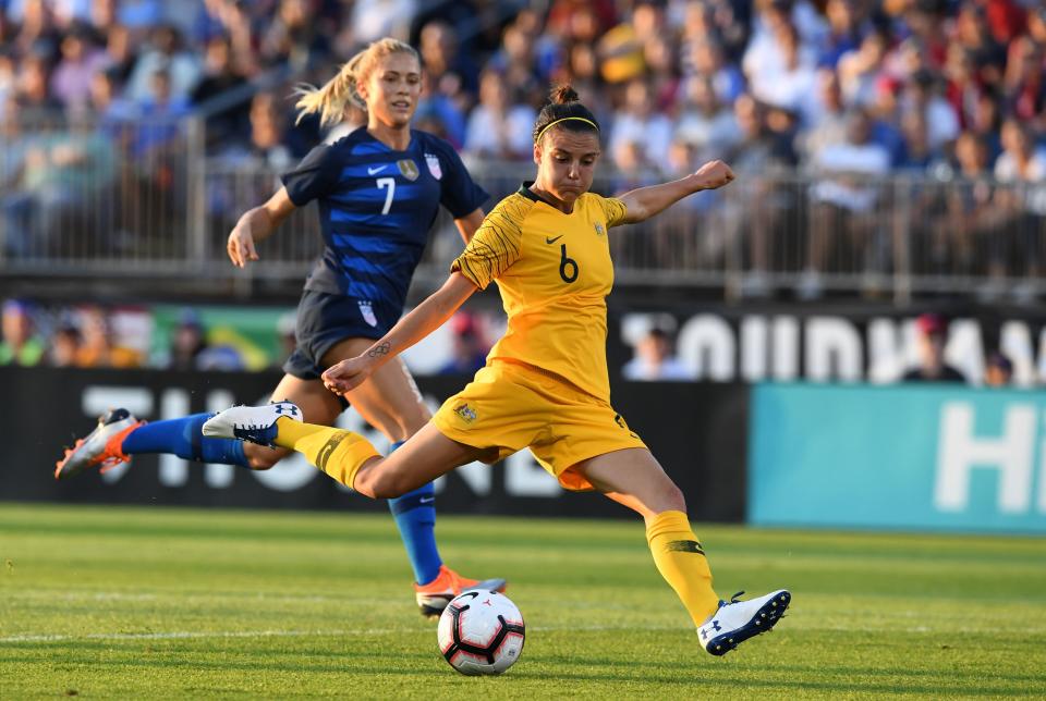 Chloe Logarzo scores for Australia against the United States in the 2018 Tournament of Nations. (Getty)