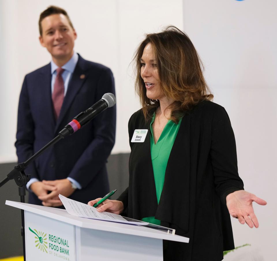 Stacy Dykstra, CEO of the Regional Food Bank of Oklahoma, speaks at a ceremony Monday, with Oklahoma Lt. Gov. Matt Pinnell nearby.