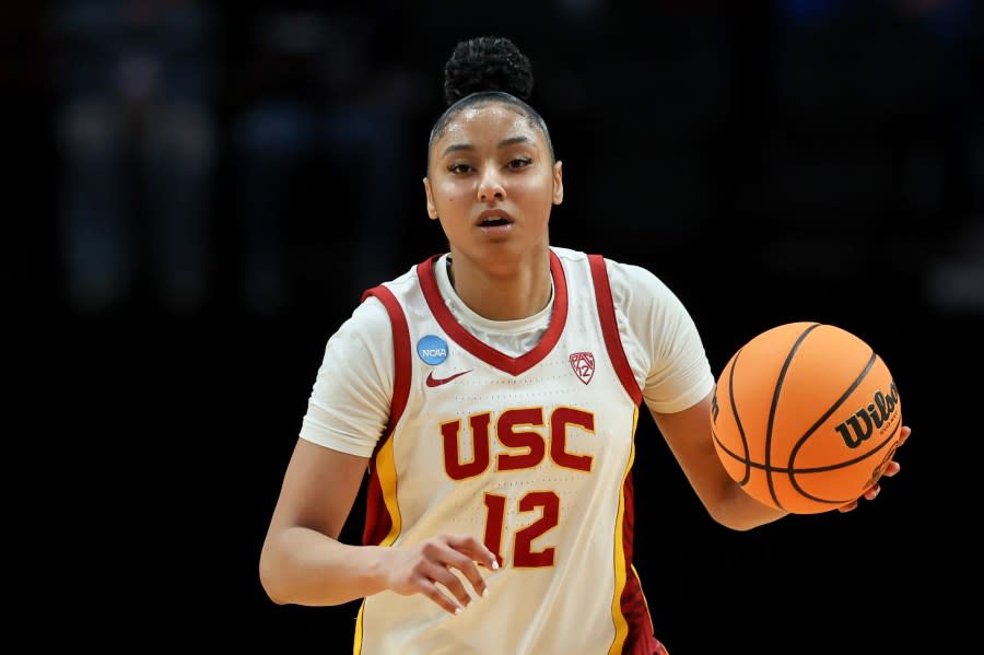 PORTLAND, OREGON – MARCH 30: JuJu Watkins #12 of the USC Trojans dribbles during the first half against the Baylor Lady Bears in the Sweet 16 round of the NCAA Women’s Basketball Tournament at Moda Center on March 30, 2024 in Portland, Oregon. (Photo by Steph Chambers/Getty Images)