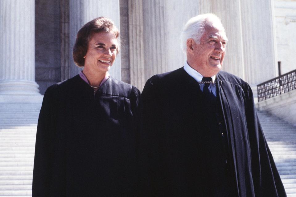 Supreme Court Associate Justice Sandra Day O'Connor with Chief Justice Warren Burger after her swearing in at the Supreme Court in Washington in September 1981 (AP)