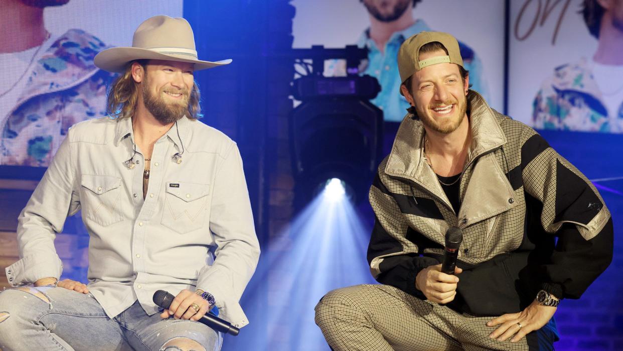 Brian Kelley and Tyler Hubbard of Florida Georgia Line speak onstage during FLORIDA GEORGIA LINE LIVE: Global Livestream Event "LIFE ROLLS ON FROM THE FGL HOUSE" in collaboration with Amazon Music, BMLG Records &amp; CMT to benefit The Community Foundation of Middle Tennessee's Nashville Neighbors Fund at FGL House on February 25, 2021 in Nashville
