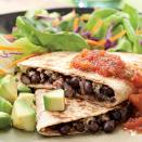 <p>In a hurry? These satisfying quesadillas take just 15 minutes to make. We like them with black beans, but pinto beans work well too. If you like a little heat, be sure to use pepper Jack cheese in the filling. Serve with: A little sour cream and a mixed green salad. <a href="https://www.eatingwell.com/recipe/250108/black-bean-quesadillas/" rel="nofollow noopener" target="_blank" data-ylk="slk:View Recipe;elm:context_link;itc:0;sec:content-canvas" class="link ">View Recipe</a></p>