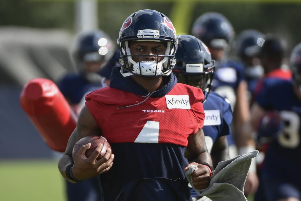 Texans quarterback Deshaun Watson (4) runs drills with the team during NFL football practice Monday, Aug. 2, 2021, in Houston. (AP Photo/Justin Rex)