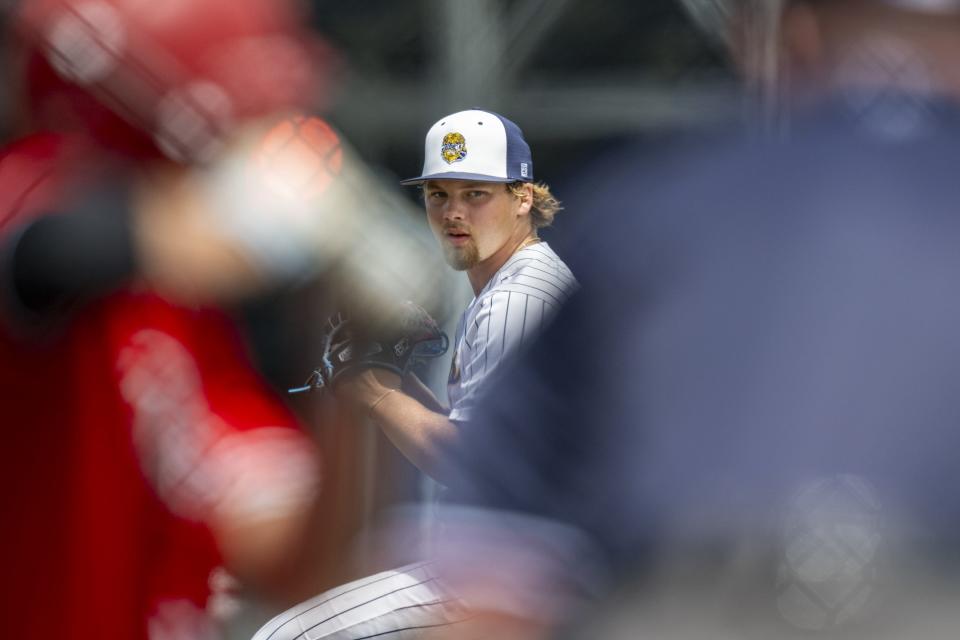 Mooresville High School senior Hogan Denny (2) delivers a pitch during a IHSAA Class 4A semi-state game against New Palestine High School, Saturday, June 8, 2024, at Mooresville High School..