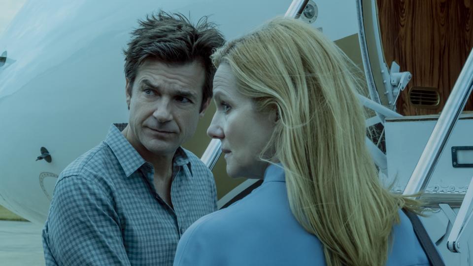 Jason Bateman as Marty Byrde stands alongside his wife Wendy (Laura Linney) in Ozark season 4