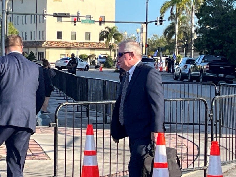 Attorney LD Donnie Murrell walks toward the federal courthouse. He represent Carlos De Oliveira, Trump's property manager at Mar-a-Lago, charged in the documents case.