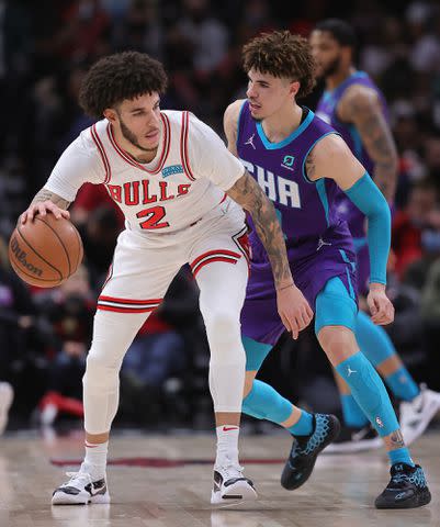 Jonathan Daniel/Getty Lonzo Ball #2 of the Chicago Bulls moves against his brother LaMelo Ball #2 of the Charlotte Hornets