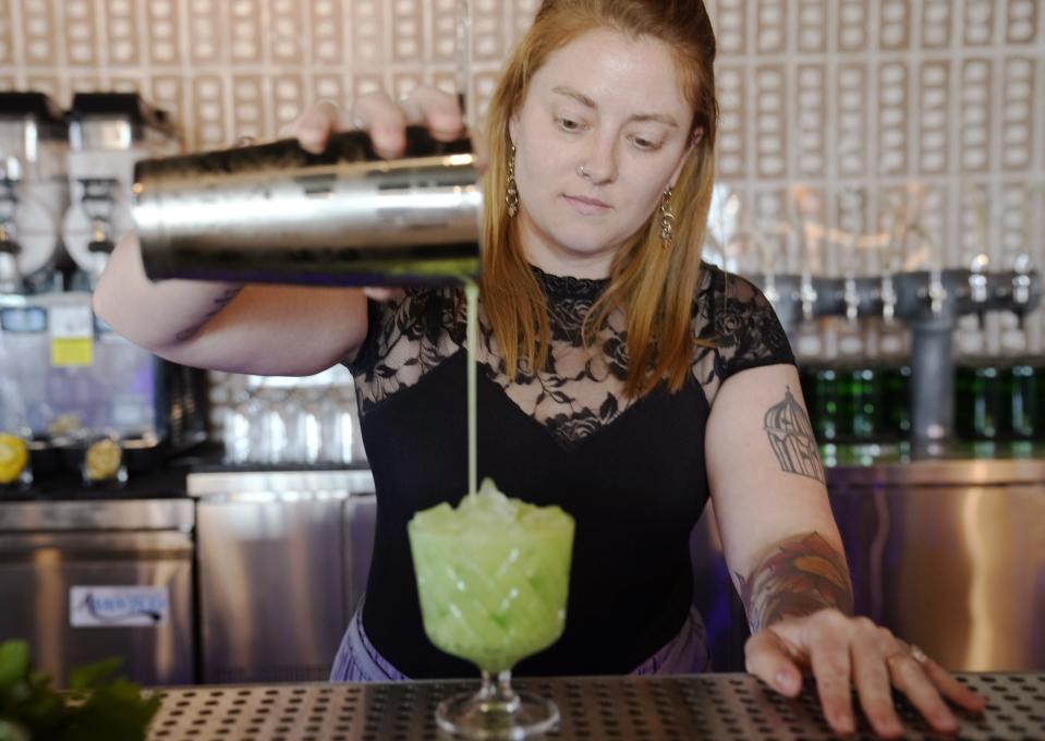 Teddy's Preserve co-owner Kyla Hein mixes the "Space Cadet" drink.