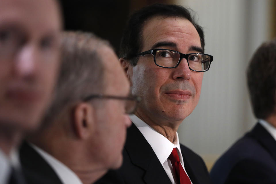 Treasury Secretary Steve Mnuchin attends a meeting of senior U.S. and Chinese officials as they meet in the Indian Treaty Room of the Eisenhower Executive Office Building on the White House complex, during continuing meetings on U.S.-China trade, Thursday, Feb. 21, 2019, in Washington. (AP Photo/Jacquelyn Martin)