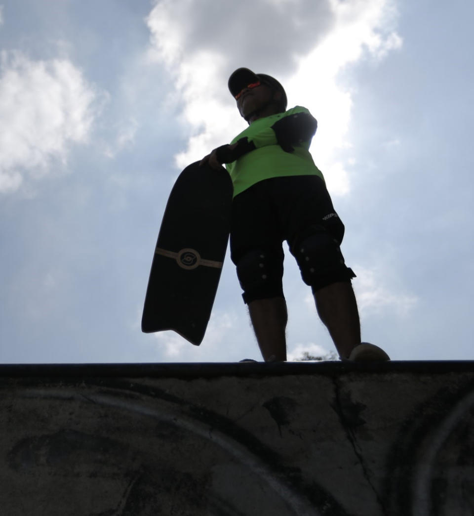 Although Abdul Rahim has had back pains from past injuries, that is not stopping him from learning more advanced moves in surf skating. — Picture by Ahmad Zamzahuri