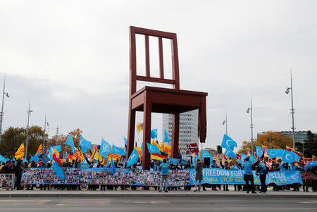 People take part in a demonstration against China during its Universal Periodic Review by the Human Rights Council in front of the United Nations Office in Geneva, Switzerland, November 6, 2018. REUTERS/Denis Balibouse