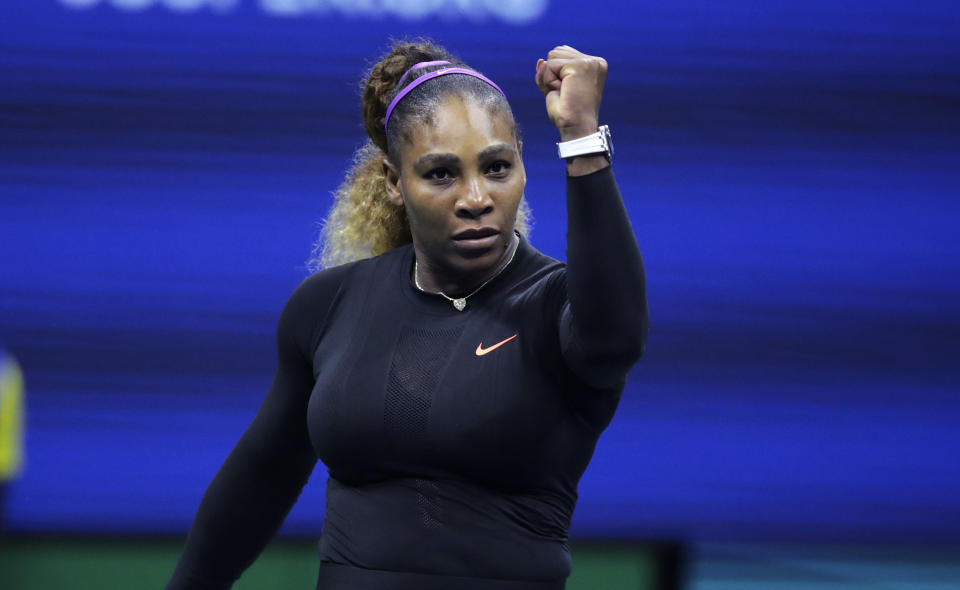 Serena Williams, of the United States, raises her fist after defeating Caty McNally, of the United States, during the second round of the U.S. Open tennis tournament in New York, Wednesday, Aug. 28, 2019. Williams won 5-7, 6-3, 6-1. (AP Photo/Charles Krupa)