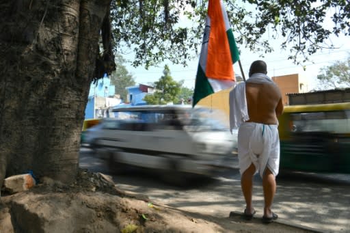 A protester in Bangalore dressed as Mahatma Gandhi to oppose India's new citizenship law, which has put Prime Minister Narendra Modi's government under unprecedented pressure