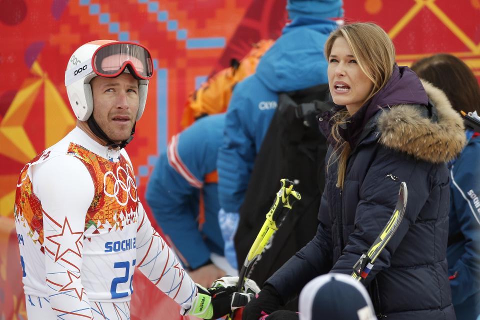 United States' Bode Miller talks with his wife Morgan near the finish area after completing Men's super combined downhill training at the Sochi 2014 Winter Olympics, Tuesday, Feb. 11, 2014, in Krasnaya Polyana, Russia. (AP Photo/Christophe Ena)