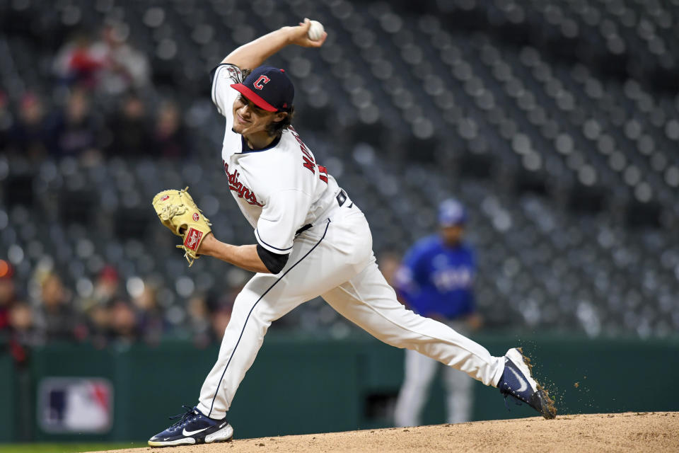 Cleveland Guardians' Eli Morgan throws to a Texas Rangers batter during the fifth inning of a baseball game Wednesday, June 8, 2022, in Cleveland. (AP Photo/Nick Cammett)