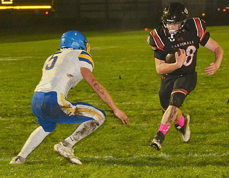 Deuel's Carson Marko nears the end zone against Redfield's Noah Johnson during a high school football game against Redfield on Friday, Oct. 13, 2023 in Clear Lake. The fifth-rated Class 11B Cardinals won 50-0.