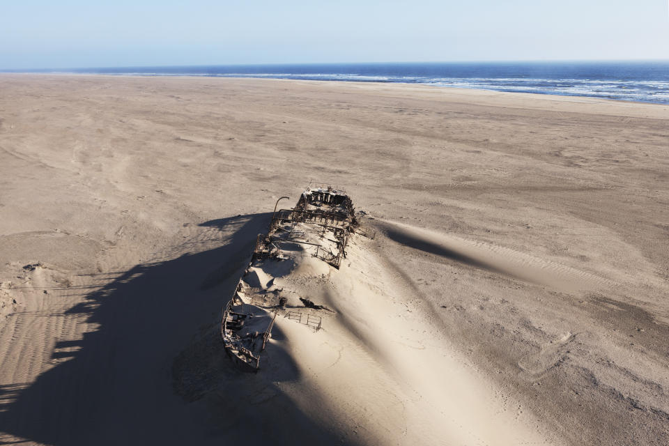 The Eduard Bohlen wreck, a supply ship for the miners that ran aground in 1909 on the Skeleton Coast, Namibia. Its steel hull and the channel they dug to try and re-float it can still be seen.