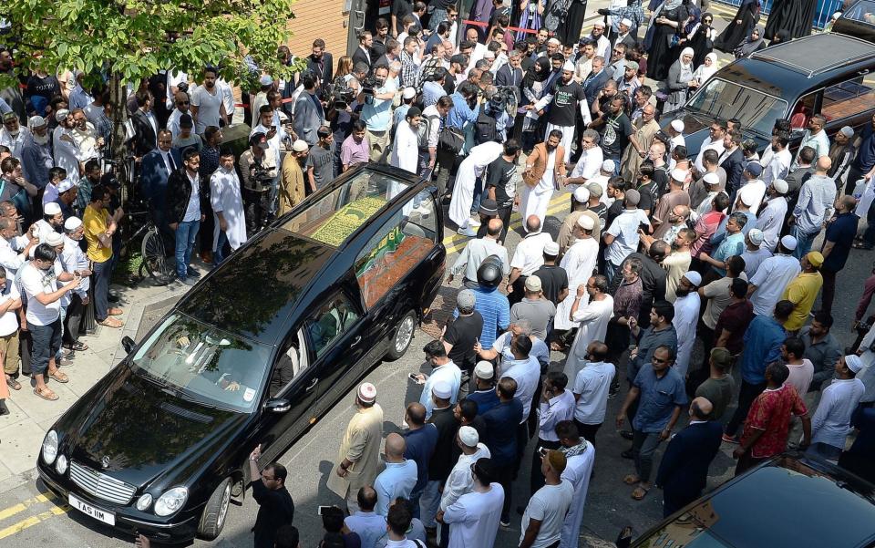The coffin of Mohammad Alhajali, a victim of the deadly Grenfell Tower blaze, is taken from the east London Mosque in Whitechapel, for his burial. - Credit: John Stillwell/PA