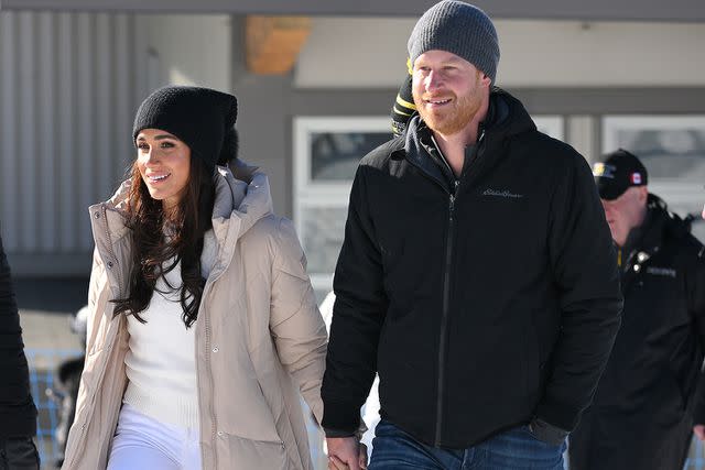 <p>Karwai Tang/WireImage</p> Prince Harry and Meghan Markle at the Invictus Games One Year To Go Event on February 14, 2024 in Canada.