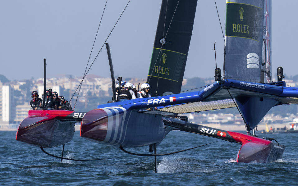 France SailGP Team helmed by Quentin Delapierre leads Switzerland SailGP Team helmed by Sebastien Schneiter during a practice session ahead of the Spain Sail Grand Prix in Cadiz, Andalusia, Spain, Friday, Sept. 23, 2022. (Bob Martin/SailGP via AP)