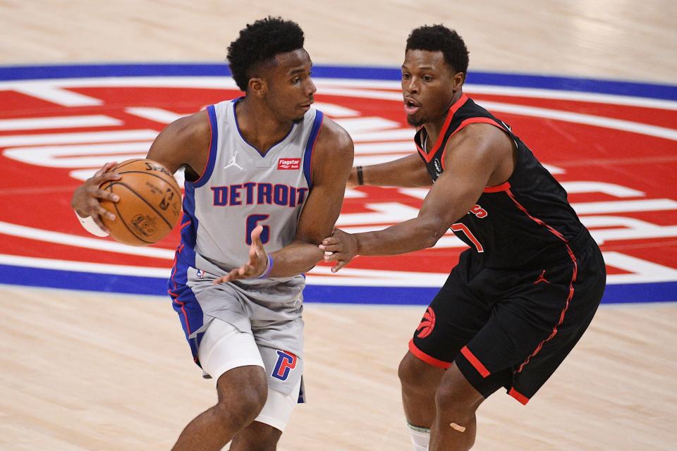 Pistons guard Hamidou Diallo drives to the basket against Raptors guard Kyle Lowry during the first quarter on Monday, March 29, 2021, at Little Caesars Arena.