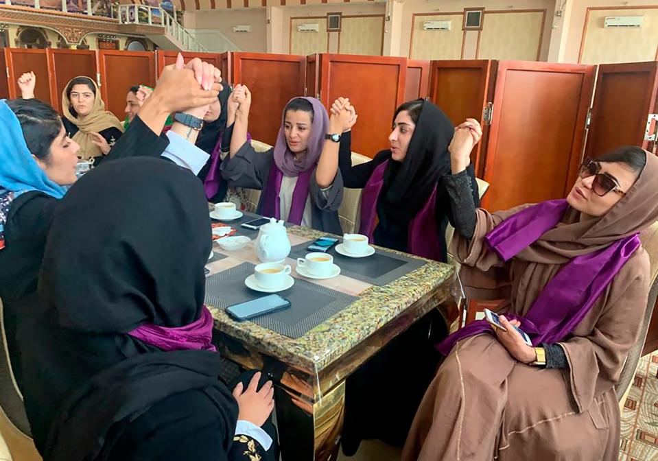 Women gather to demand their rights under the Taliban rule during a protest in Kabul, Afghanistan, Saturday, Sept. 4, 2021. The Taliban have promised an inclusive government and a more moderate form of Islamic rule than when they last ruled the country from 1996 to 2001. But many Afghans,  especially women, are deeply skeptical and fear a rollback of rights gained over the last two decades.