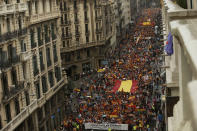 <p>Demonstrators holding a banner that reads “Catalonia is Spain” march defending the unity of Spain and against a disputed referendum on the region’s independence that separatist politicians want to hold Sunday, in Barcelona Saturday, Sept. 30 2017. (Photo: Manu Fernandez/AP) </p>