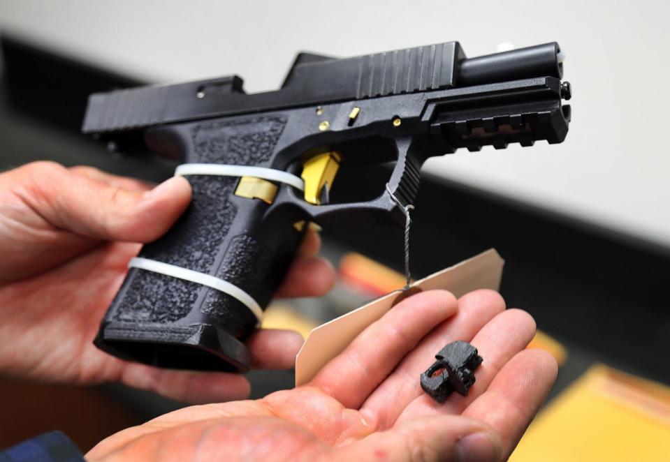 PHOTO: A machine gun conversion device for a Glock hand gun was in custody of the ATF Boston Bureau. (John Tlumacki/The Boston Globe via Getty Images)