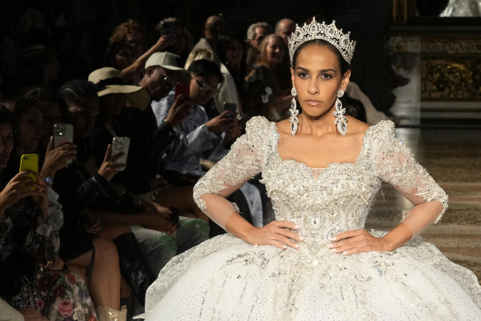 Mariel Colon wears a creation as part of the April Black Diamond Spring Summer 2025 collection, in Milan, Italy, Sunday, Sept. 22, 2024. (AP Photo/Antonio Calanni)