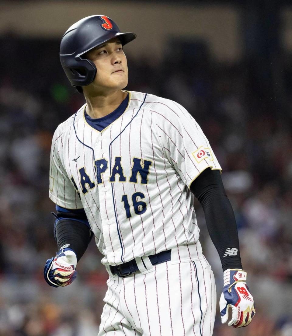 Japan pitcher Shohei Ohtani (16) looks on after hitting a fly ball to right field against Mexico during the fourth inning of a semifinal game at the World Baseball Classic at loanDepot Park on Monday, March 20, 2023, in Miami, Fla.