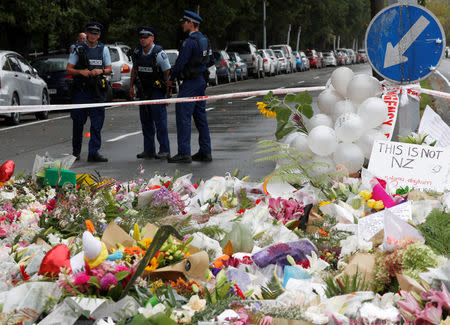 Flowers are placed outside Al Noor mosque in Christchurch, New Zealand, March 17, 2019. REUTERS/Edgar Su