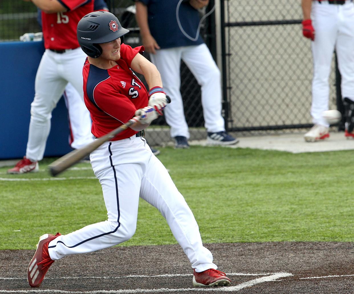 Bedford North Lawrence's Chase Rynders (1) connects for a single against Mitchell Friday, May 3, 2024.