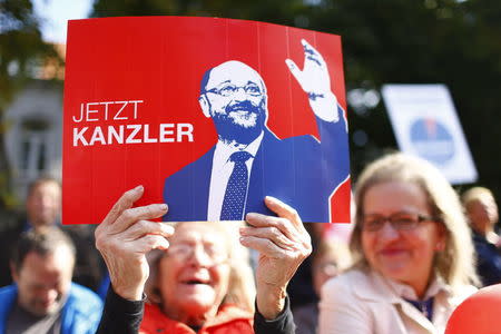 Supporters of Social Democratic Party (SPD) Chancellor candidate Martin Schulz attend the final campaign rally in Aachen, Germany, September 23, 2017. REUTERS/Thilo Schmuelgen