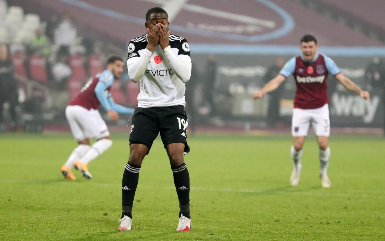 Fulham's English striker Ademola Lookman (C) reacts after missing a penalty in the last minute of the game during the English Premier League football match between West Ham United and Fulham at The London Stadium, in east London on November 7, 2020