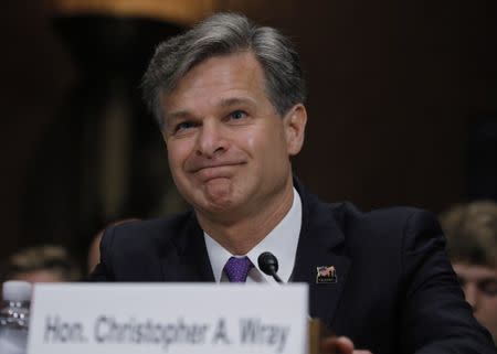 Christopher Wray is seated prior to testifying before a Senate Judiciary Committee confirmation hearing on his nomination to be the next FBI director on Capitol Hill in Washington, U.S., July 12, 2017. REUTERS/Carlos Barria