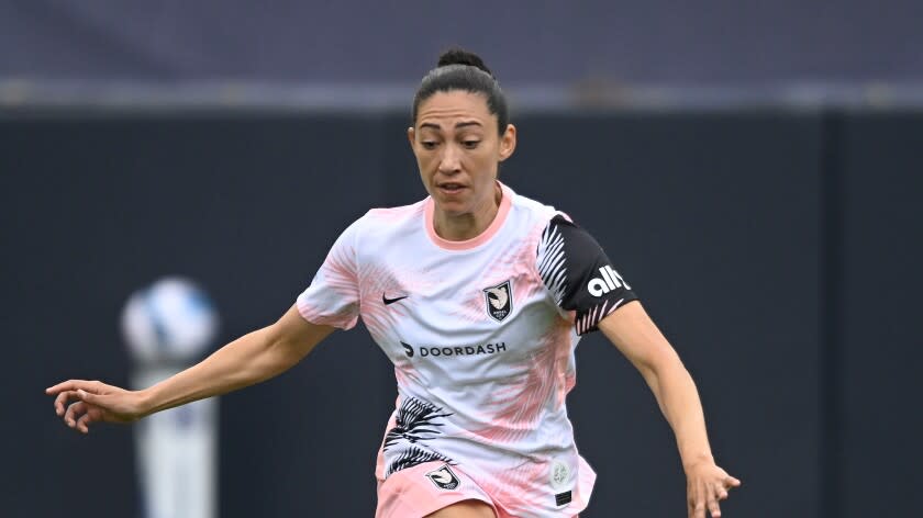 Angel City's Christen Press plays during an NWSL Challenge Cup soccer match against Wave FC, Saturday, April 2, 2022, in San Diego. (AP Photo/Denis Poroy)