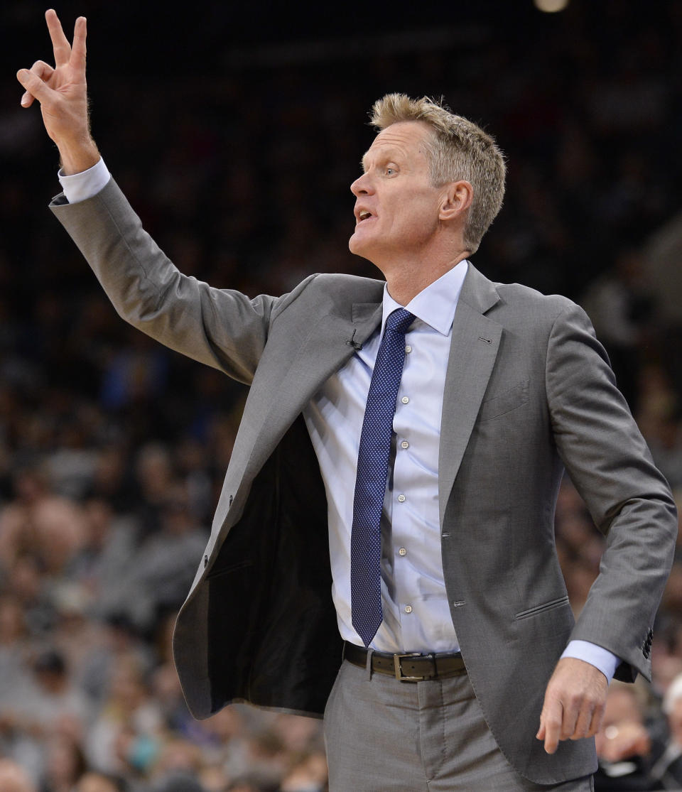 Golden State Warriors head coach Steve Kerr yells to his players during the first half of an NBA basketball game against the San Antonio Spurs, Saturday, March 11, 2017, in San Antonio. (AP Photo/Darren Abate)