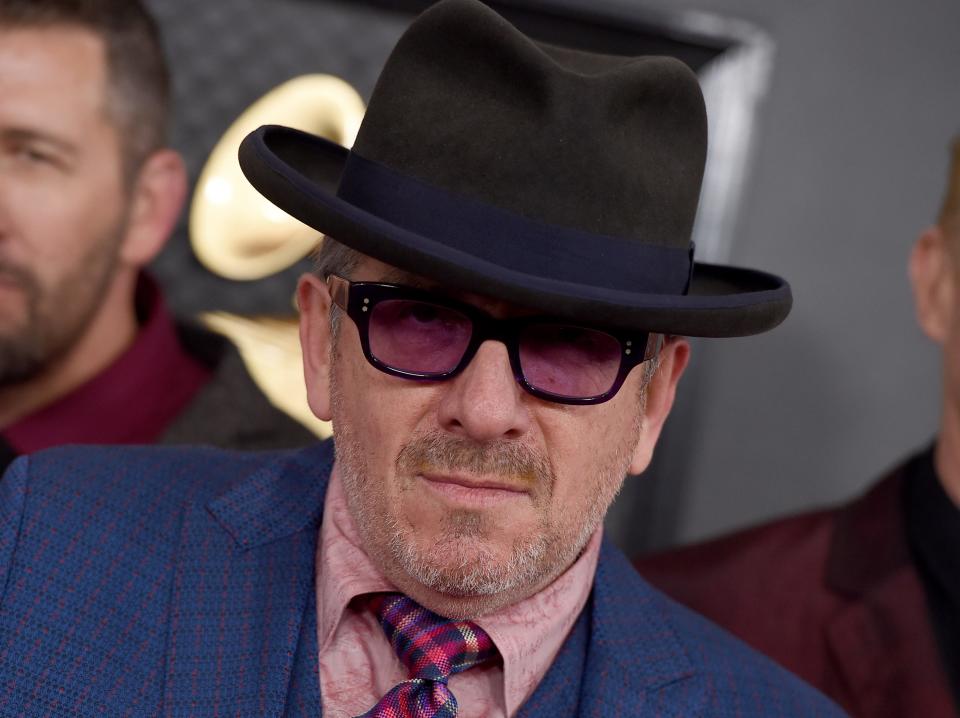 Elvis Costello arrives at the 62nd annual Grammy Awards at the Staples Center on Sunday, Jan. 26, 2020, in Los Angeles.