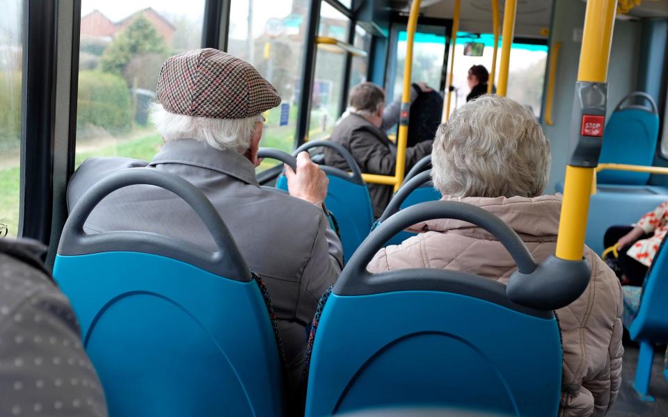 elderly couple on public transport rural bus service, norfolk, england - David Burton / Alamy Stock Photo