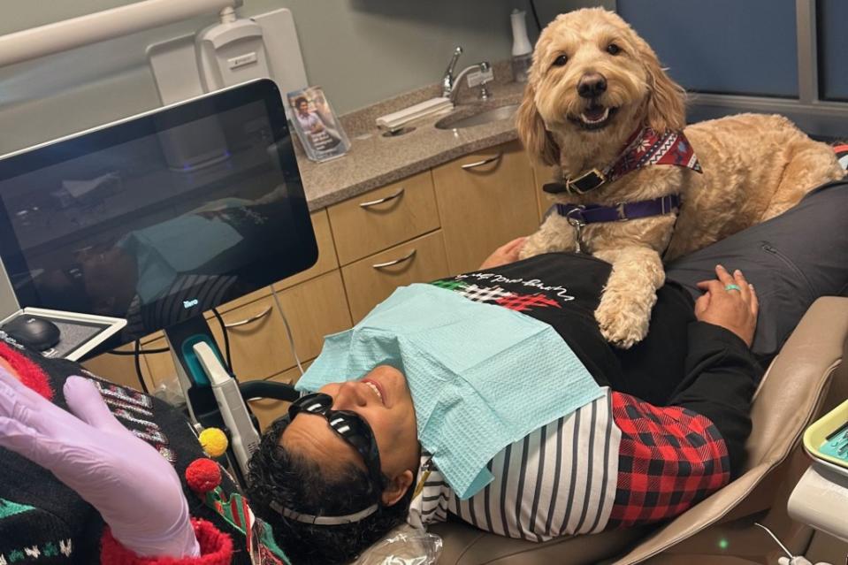 A dental office in downtown Minneapolis offers a unique service for their patients — an emotional support dog. Instagram/@jandddental; April Kline