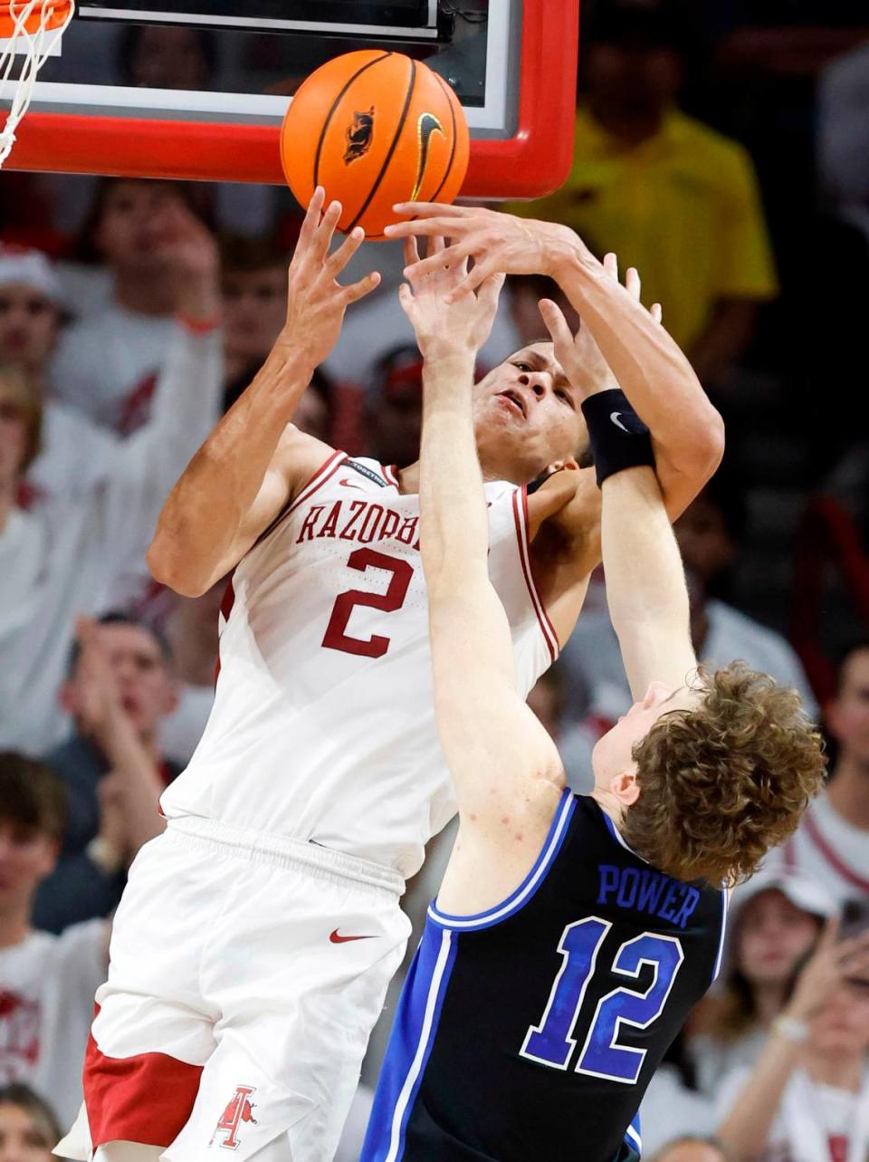 Arkansas’ Trevon Brazile (2) pulls in the rebound from Duke’s TJ Power (12) during the second half of Arkansas’ 80-75 victory over Duke at Bud Walton Arena in Fayetteville, Ark., Weds. Nov. 29, 2023.