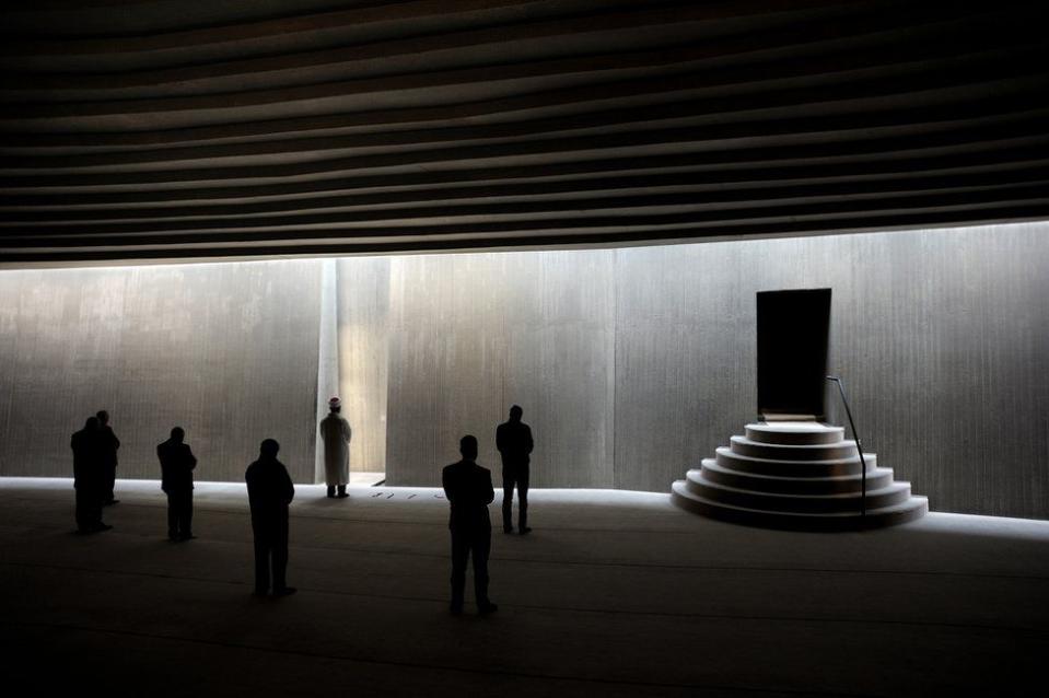 <p>Worshipper wait to enter this modern and non-traditional mosque in Istanbul, Turkey. (Bulent Suberk) </p>